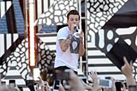 Louis Tomlinson of One Direction performs on Good 