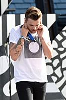 Louis Tomlinson of One Direction performs on Good 