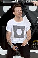 Louis Tomlinson of One Direction performs on Good 