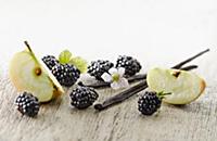Blackberry, Rubus cultivar. Several berries arrang