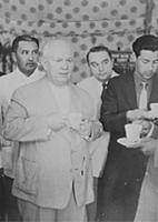 SOVIET MINISTER NIKITA KHRUSHCHEV  DRINKS A CUP OF