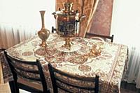 Rosskazovka, Russia: Tea samovar on table. ©Jeff G