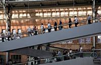 Spain, Madrid, Passengers using the escalators ins
