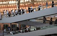 Spain, Madrid, Passengers using the escalators ins