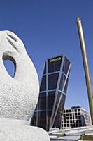Spain, Madrid, Puerta de Europa with the monument 