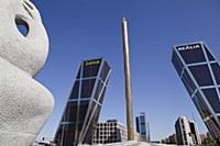 Spain, Madrid, Puerta de Europa with the monument 