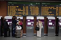 Spain, Madrid, Passengers using the self-service t