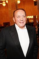 Советский и российский телеведущий Александр Масля