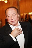 Советский и российский телеведущий Александр Масля