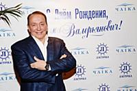 Советский и российский телеведущий Александр Масля