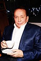 Советский и российский телеведущий Александр Масля